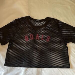 This Forever 21 top is a large and is see through.It is perfect for a night out✨